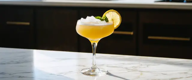 Blended Frozen Spritz Made With Limoncello, Prosecco, And A Touch Of Fresh Basil