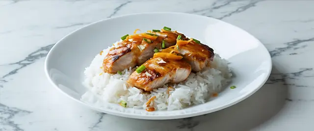 Orange Glazed Chicken and Jasmine Rice Bowl with Almond Citrus Drizzle