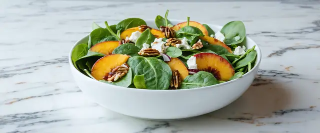 Peach, Basil, and Goat Cheese Spinach Salad with Candied Pecans
