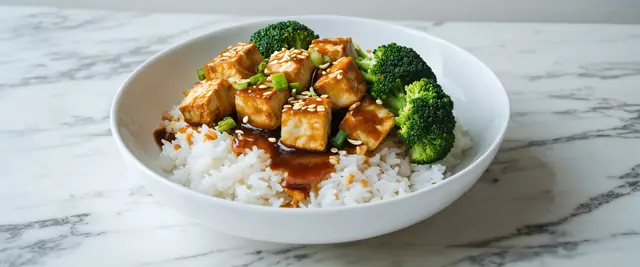 Sesame Crusted Tofu and Broccoli Rice Bowl with Hoisin Ginger Sauce